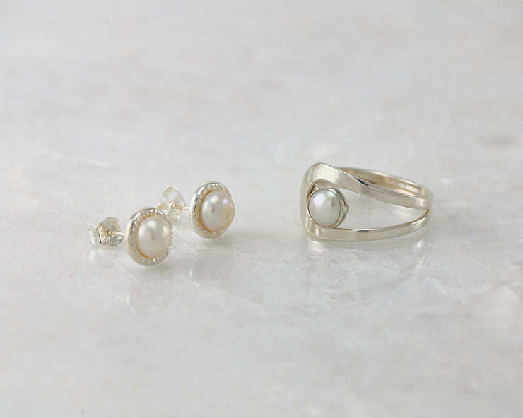 pearl stud earrings and matching pearl ring