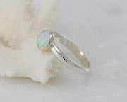 opal ring on coral