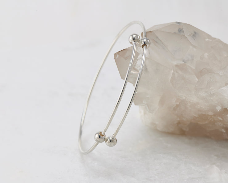 adjustable bangle bracelet shown on crystal rock