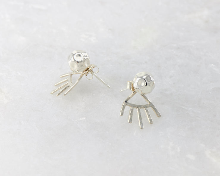 silver hammered ear jacket stud earrings on white marble