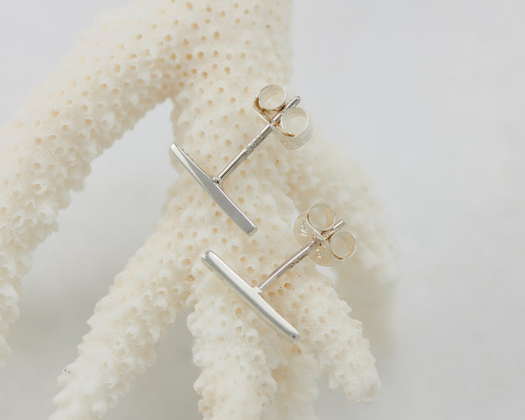Simple Bar Stud Earrings on coral