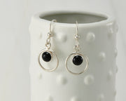 Silver polished black onyx earrings on dotted vase