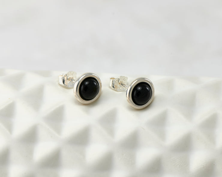 silver black onyx stud earrings on geometric vase