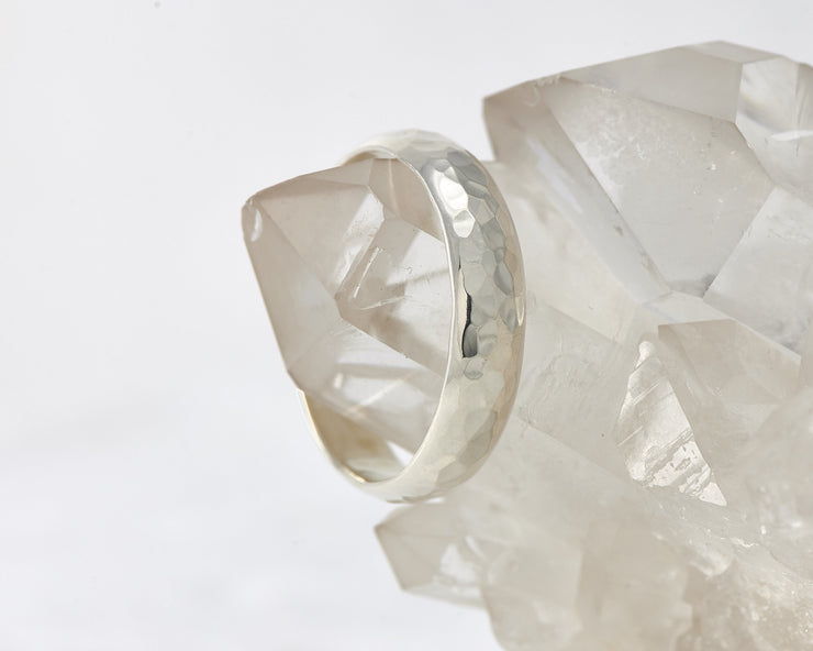 Wedding ring resting in crystal rock