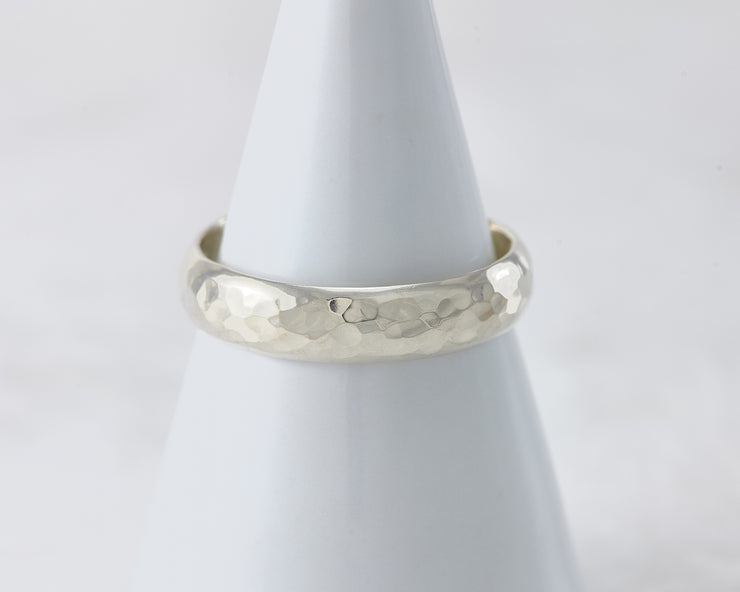 simple hammered ring on white ring holder