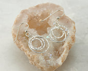 hammered hoop silver polished earring in quartz
