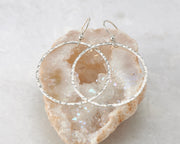 large hammered hoop silver earring in quartz