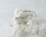 opal bracelet silver wrapped around white rock