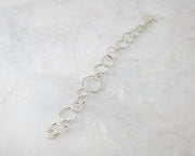 latch style chain link silver bracelet fully stretched out