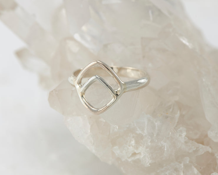 Silver Chevron ring on crystal rock