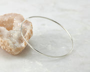 hammered latch bangle bracelet shown on crystal rock