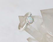silver opal ring on crystal rock