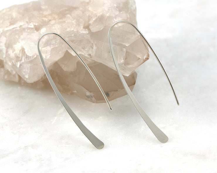 Open Hoop Earrings shown on a crystal rock