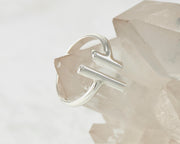 parallel bars ring on crystal rock