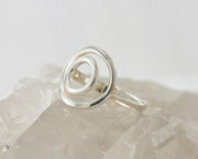 silver circles ring on crystal rock