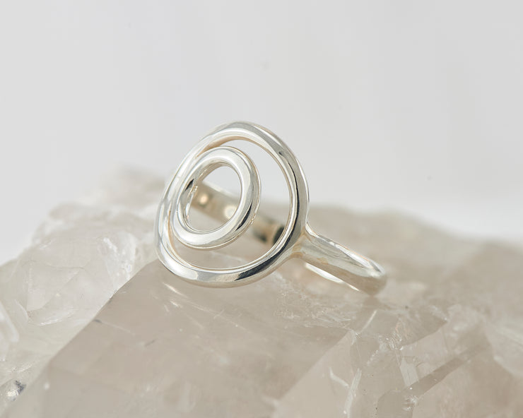 silver circles ring on crystal rock