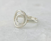 simple circles silver ring on white marble