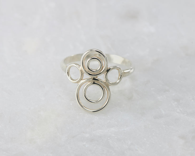 many circles ring on white marble