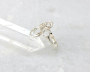 Silver many circles ring on crystal rock