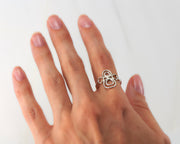 woman wearing silver circles ring