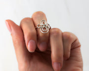 woman wearing silver circles ring