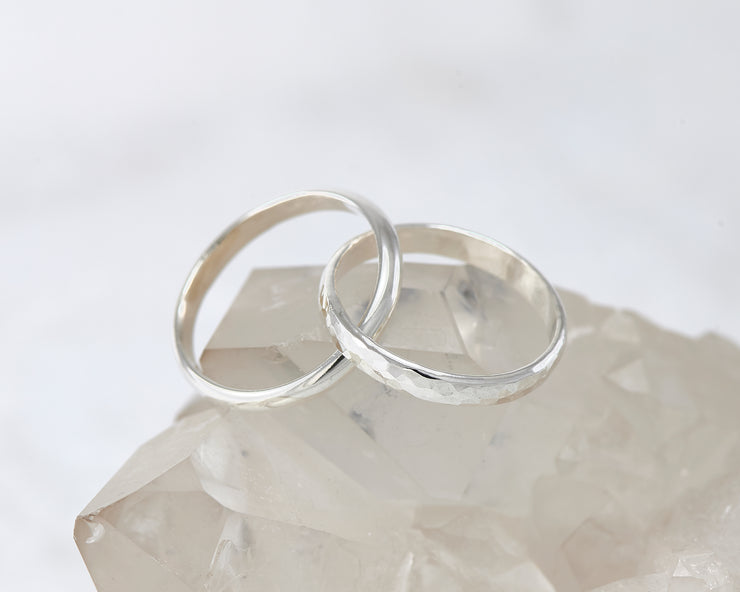 interlocking russian wedding rings on crystal rock