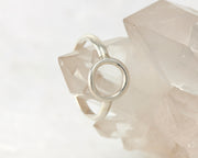 silver cirle ring on crystal rock