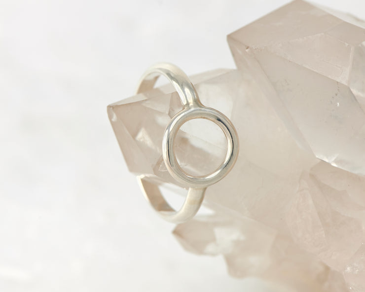 silver cirle ring on crystal rock