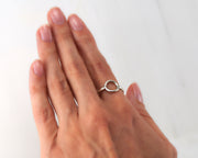 woman wearing silver circle ring
