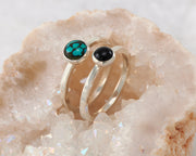 central turquoise and black onyx ring in quartz