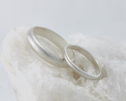 top down view of brushed wedding ring set