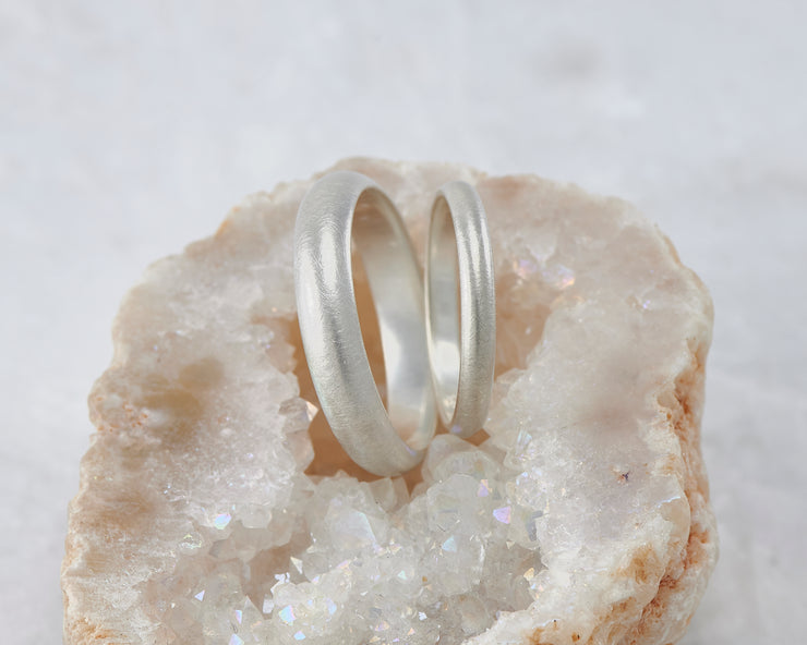 two brushed wedding bands in crystal