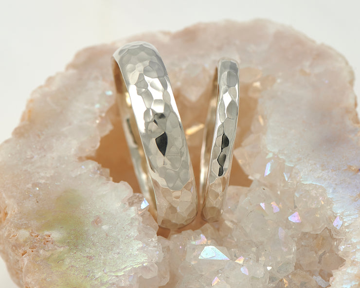 two hammered wedding bands in crystal