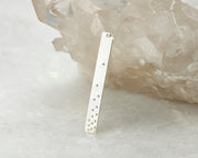 silver bar y-necklace on white crystal
